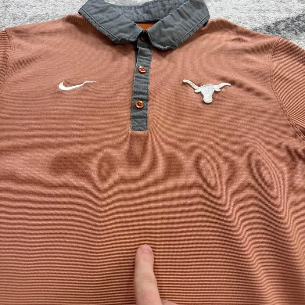 Nike Dri Fit golf polo university of Texas longhorns fits like a small (stain)